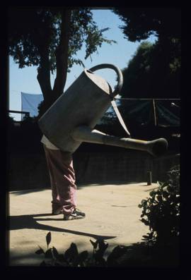 Windfall of Memories still, Watering can costume by Cameron Brian